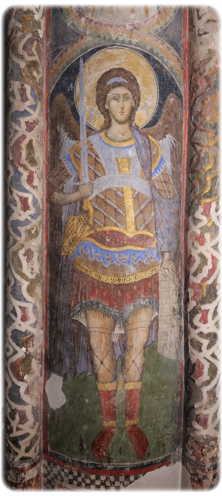 Fresco - an archangel with a sword, on a pillar in the nave